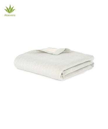 Folded frosted grey Aluvera towel on a white background with a small Aloe Vera tag.