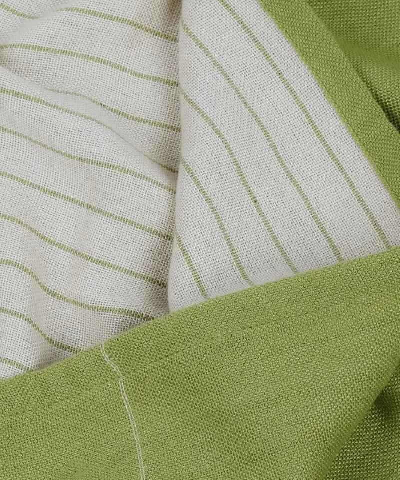 Close-up of aloe green and white striped fabric