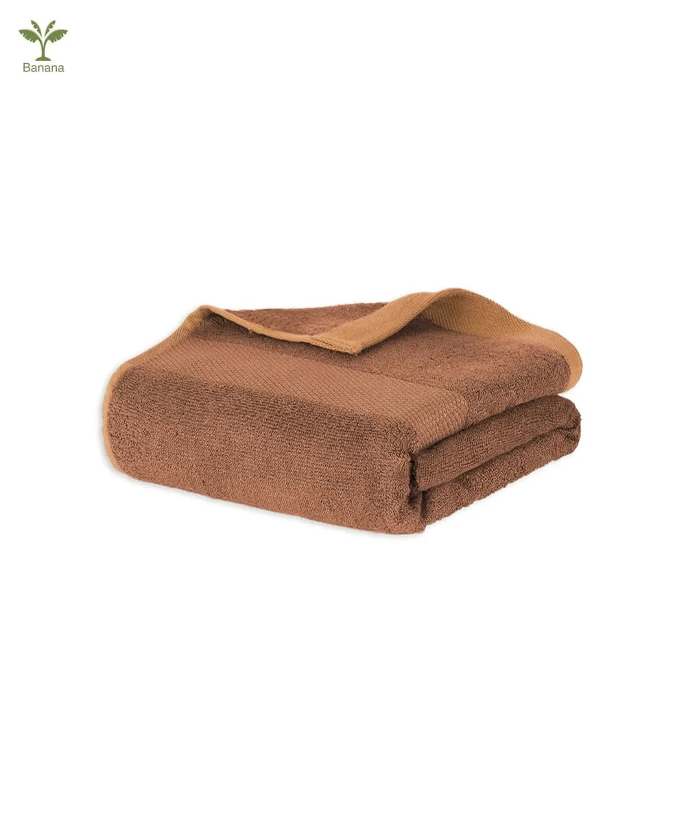 Bombay Brown folded towel on a white background