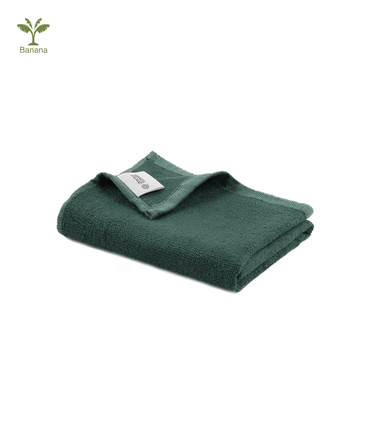 Folded banana terry gym towel on a white background