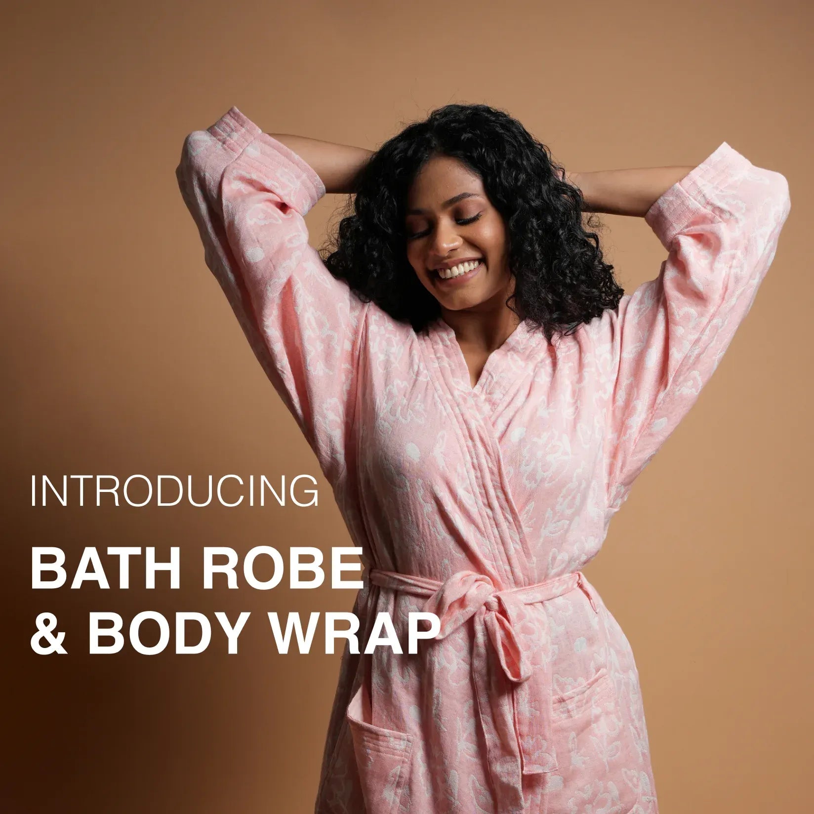 Woman wearing a pink bathrobe against a brown background with text overlay.
