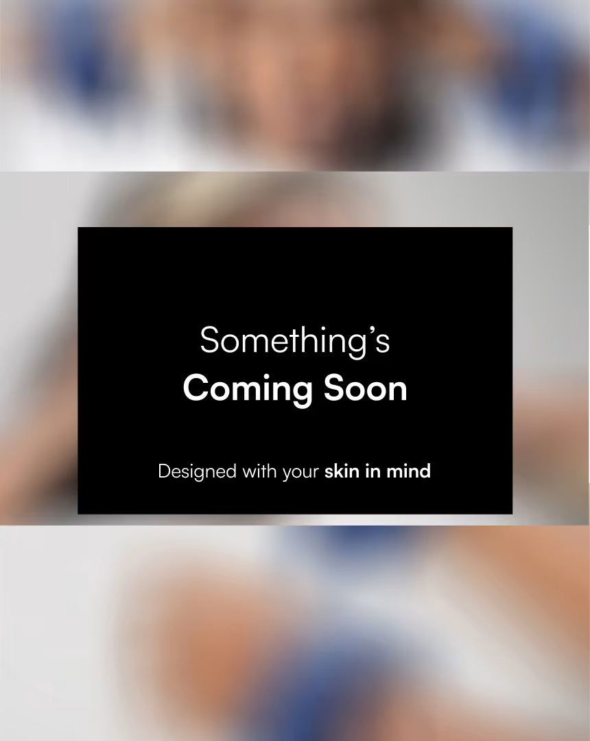 Placeholder image with 'Something's Coming Soon' text on a blurred background