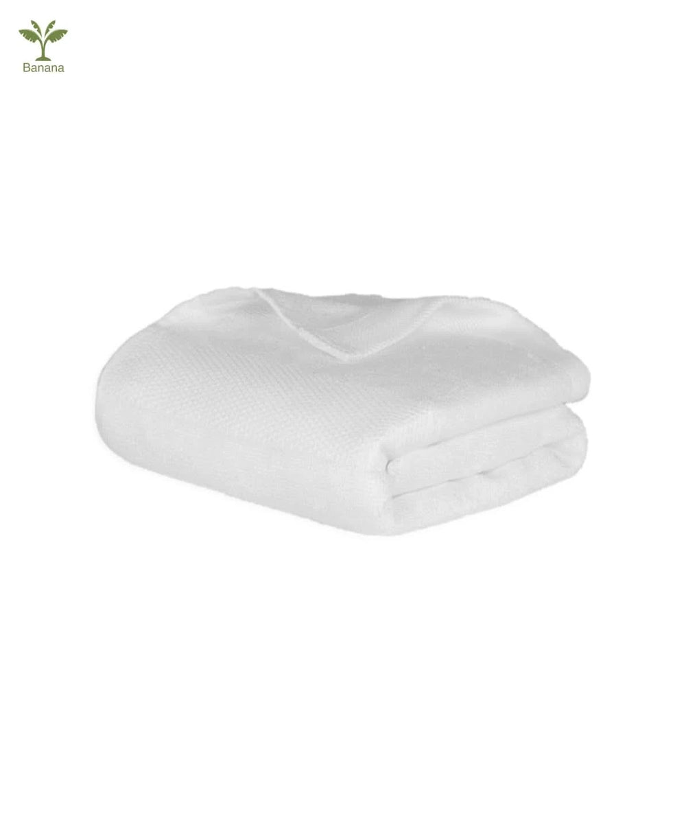 Folded banana super light terry towel - simply white on a white background