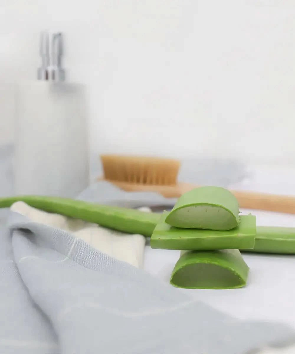 Sliced aloevera on the grey towel and white background