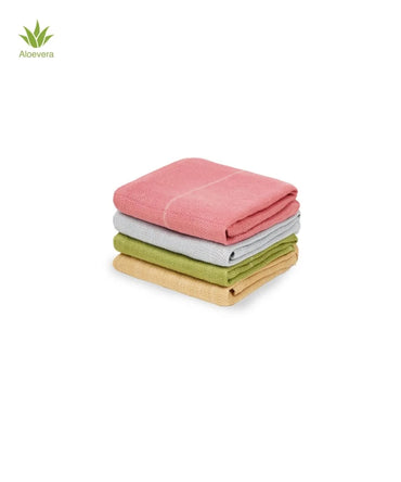 Stack of folded towels in pink, gray, and green on a white background with Akevera logo.