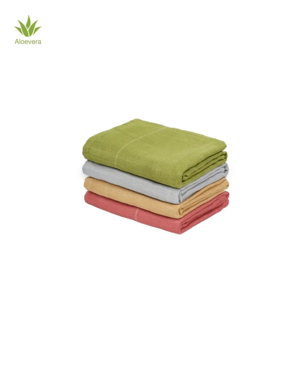 Stack of folded towels in aloe green, frosted grey, sunset gold , and apricot brandy on a white background with aloevera icon.