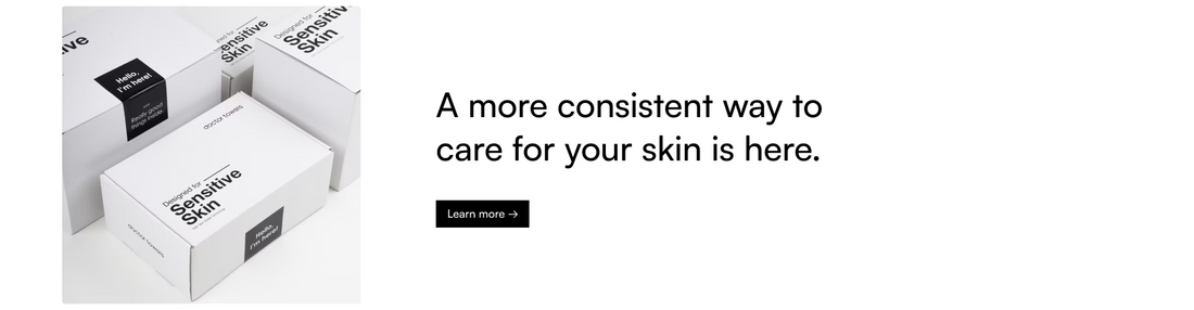 White skincare product packaging with text on a white background