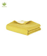 Yellow folded towel on a white background with Aloevera logo.