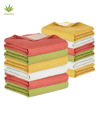 Stack of folded colorful aluvera towels with Aloevera logo on a white background