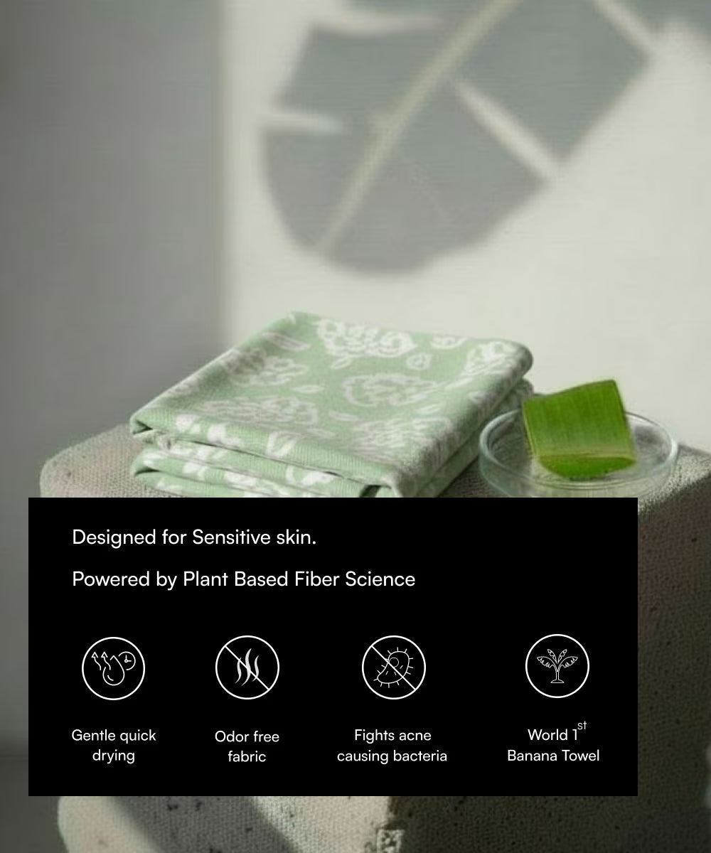 Green banana leaf towel on a stone surface with aloe vera, labeled for sensitive skin.