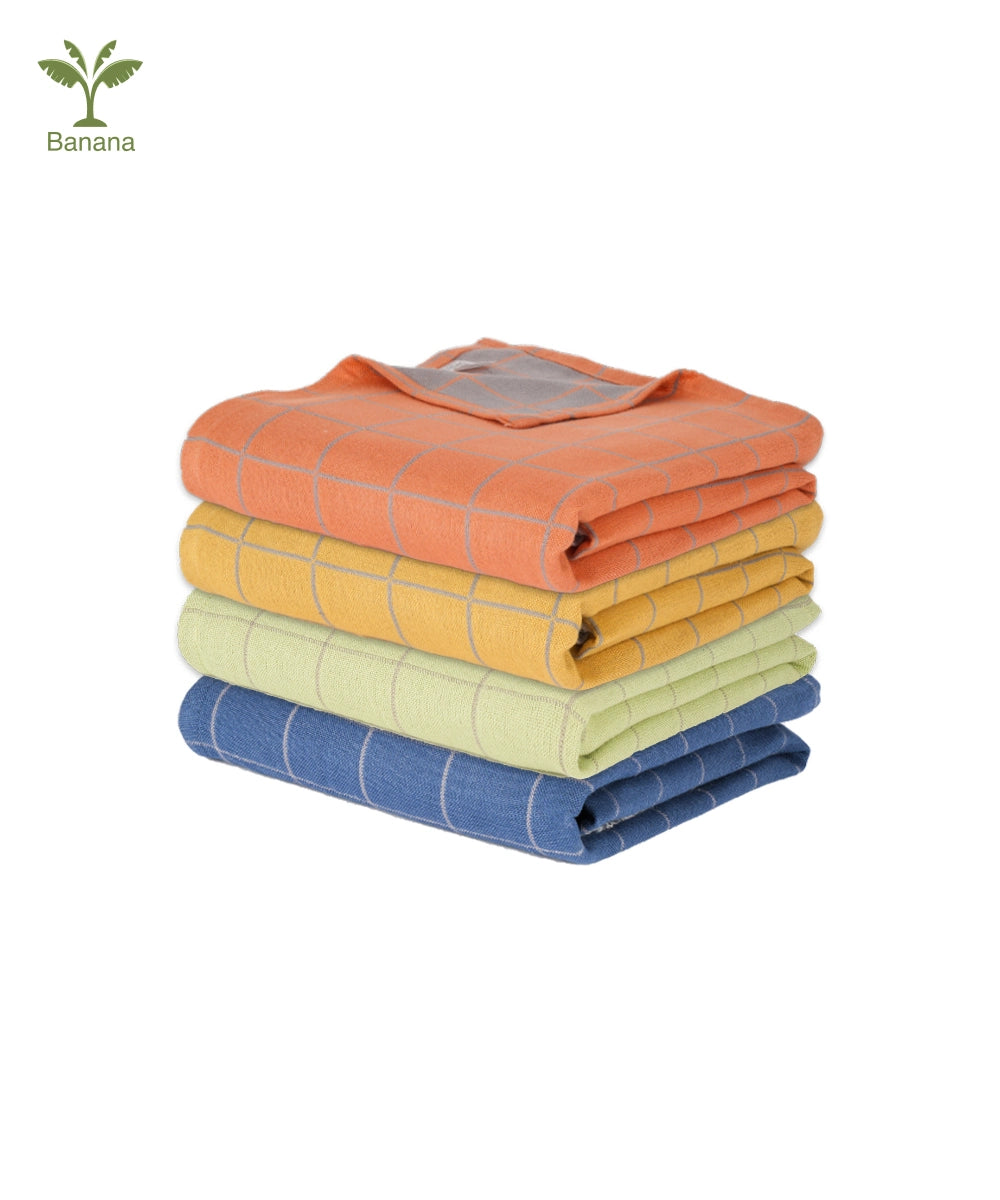 Stack of folded Banana double cloth bath towel  in orange, yellow, and blue on a white background.