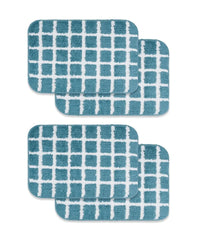 Four blue checkered bath mats on a white background