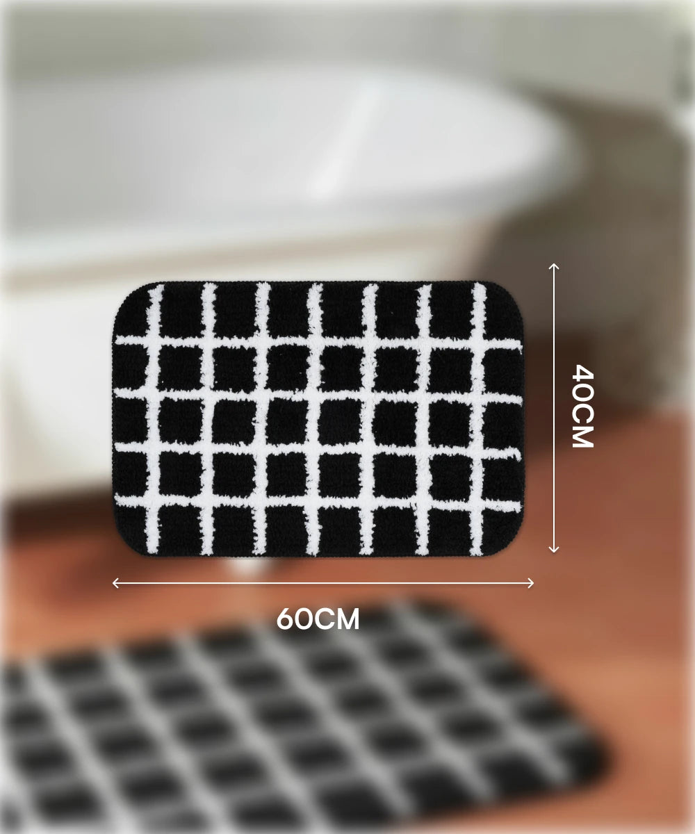 Black and white checkered mat with dimensions on a blurred background