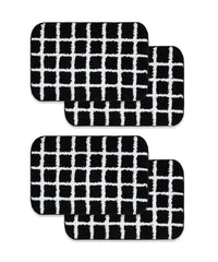Four black and white checkered bath mats on a white background
