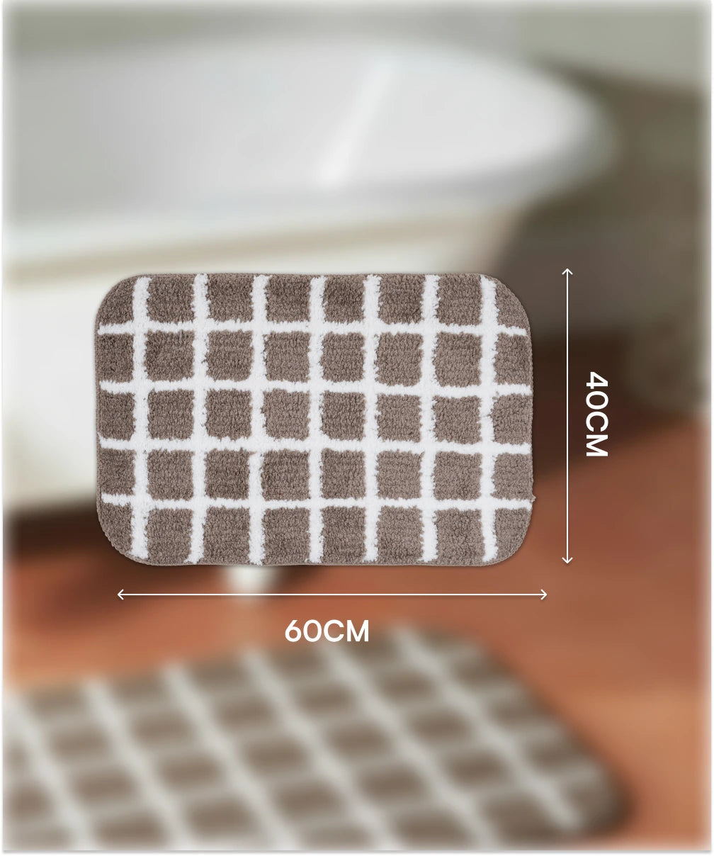Checkered bath mat with grid pattern and measurements on a blurred background