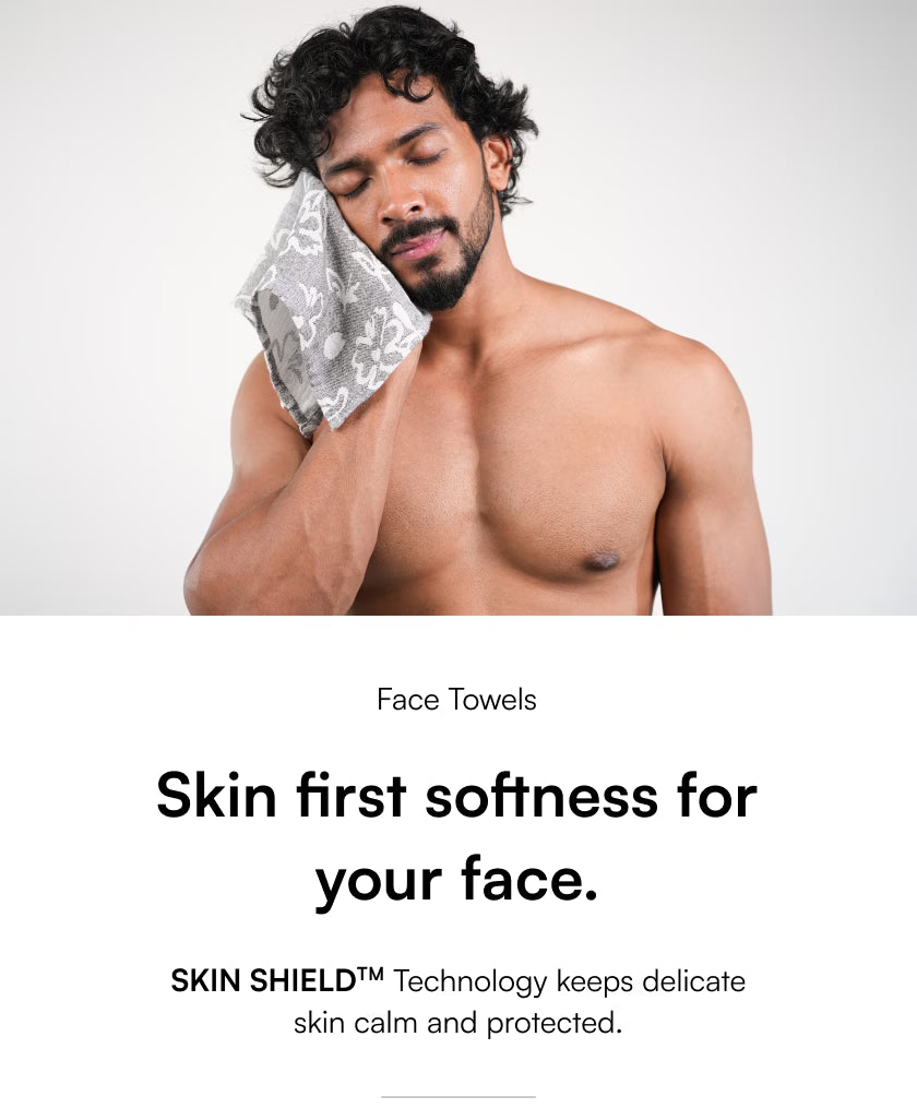 Man with a towel on his face with text about Skin Shield technology for face towels.