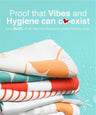 Stack of colorful towels with text about hygiene and bacteria-killing properties on a light blue background.