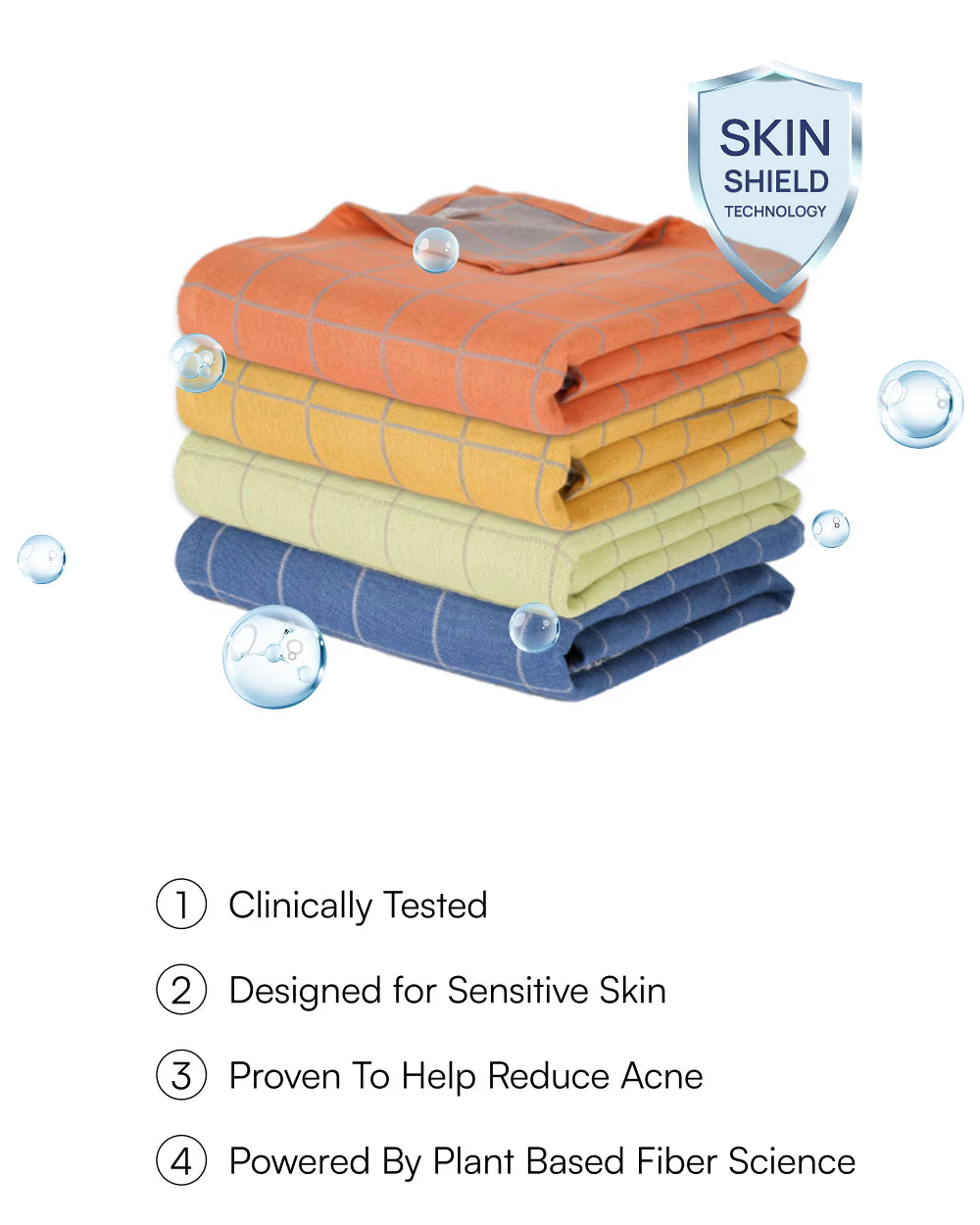 Stack of folded towels with 'Skin Shield' technology label and product benefits listed.