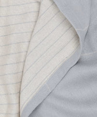 Close-up of gray fabric with subtle patterns