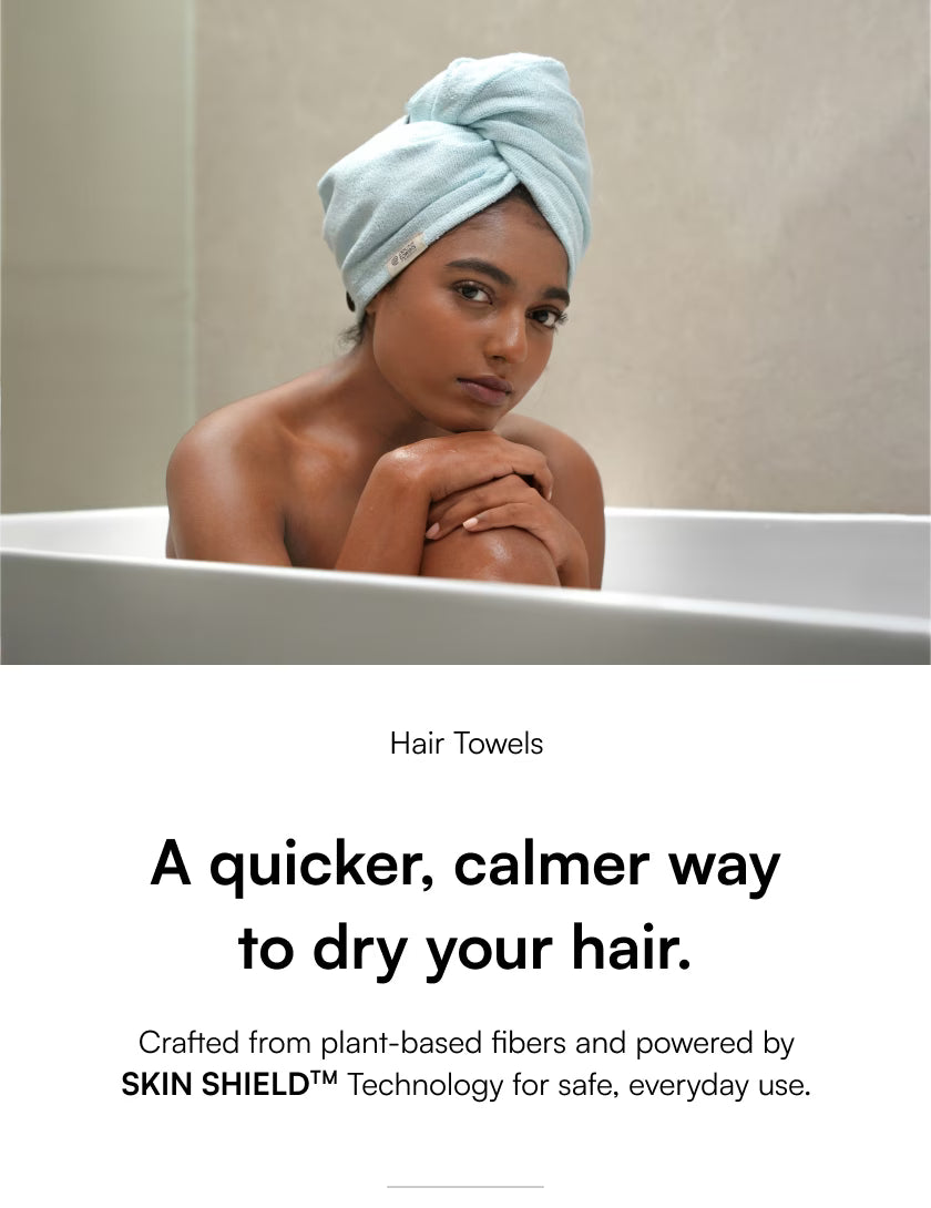 Woman with a towel on her head sitting in a bathtub, with text about hair towels.