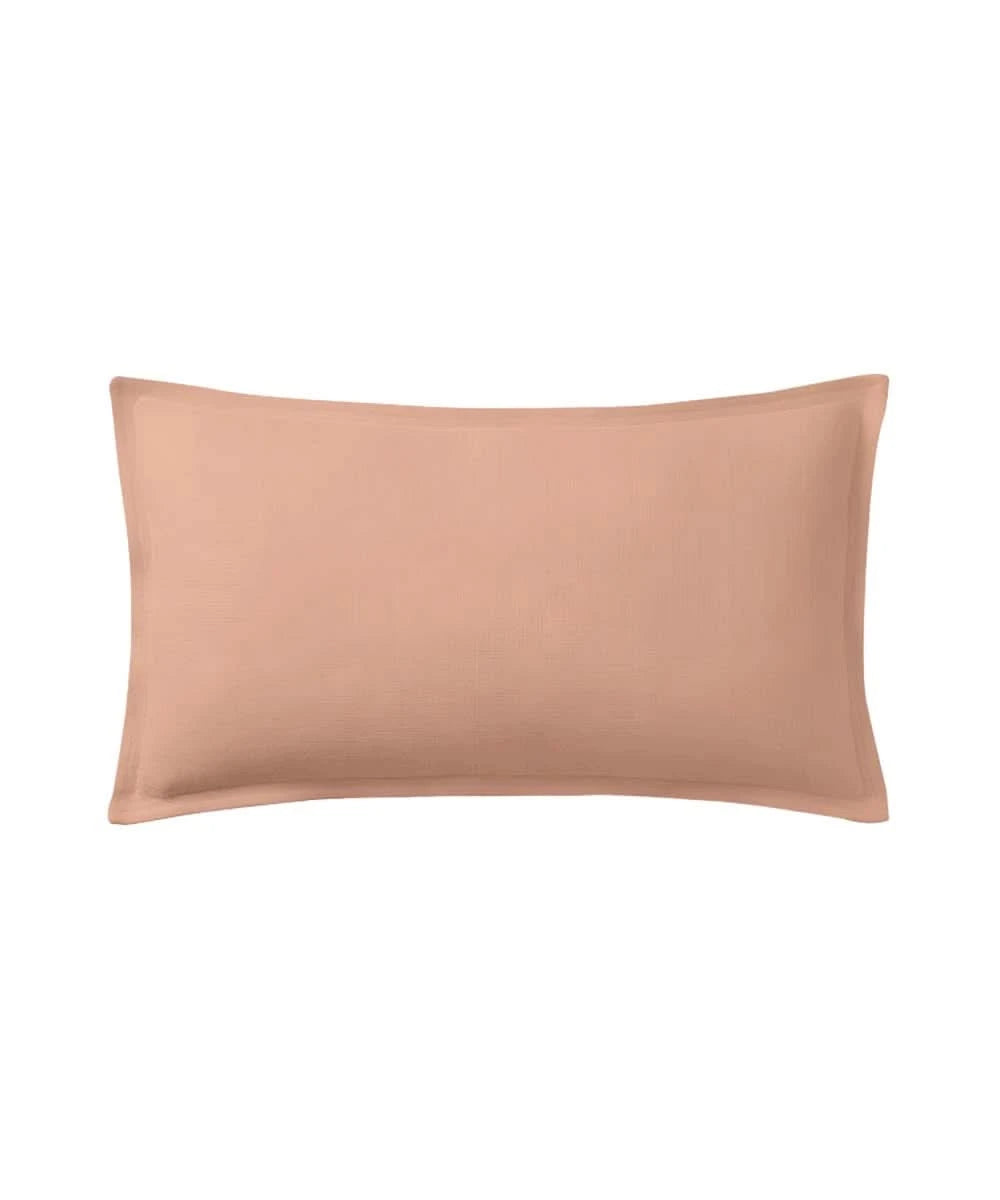 Honey peach pillow on a white background