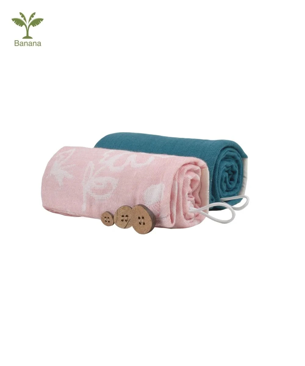 Coral - Banana floral hair towel and Banana double cloth hair towel - dutch teal on a white background.