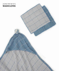 Set of two washcloths with blue and gray grid pattern on a white background